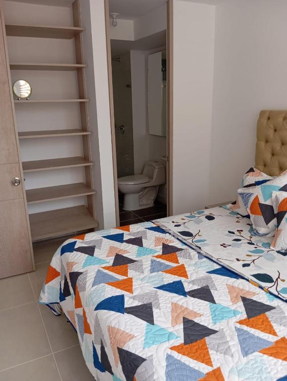 Postel nebo postele na pokoji v ubytování Apartamento en Peña Azul "La Aldea" Ricaurte, Cundinamarca