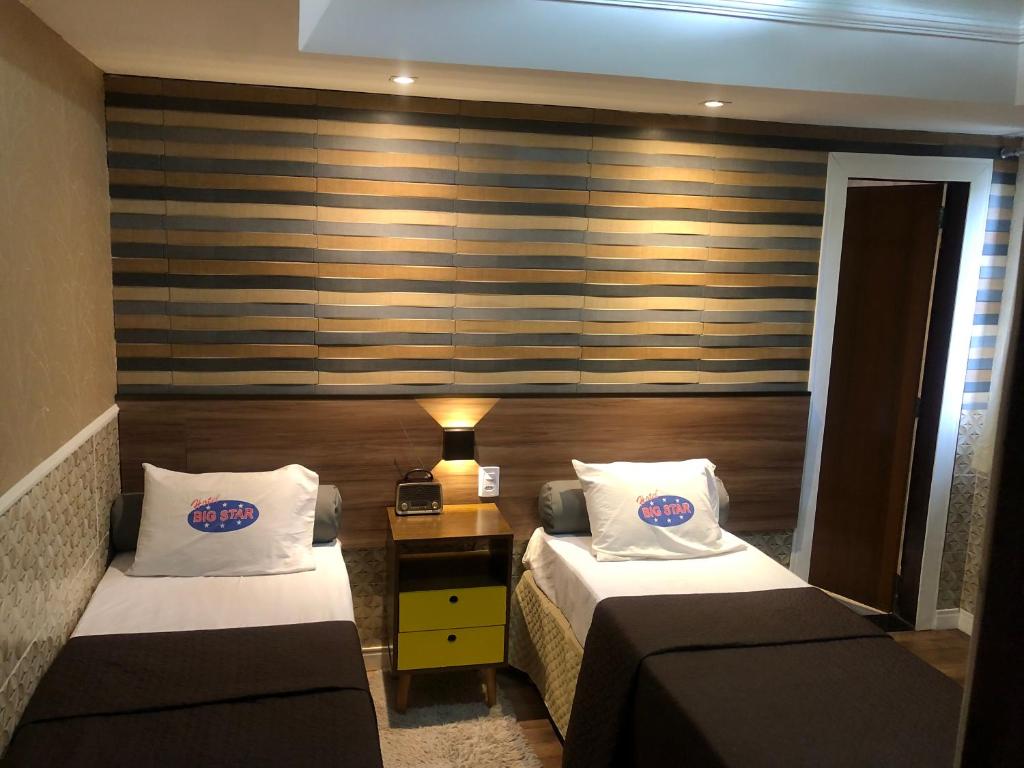 Postel nebo postele na pokoji v ubytování HOTEL BIGSTAR