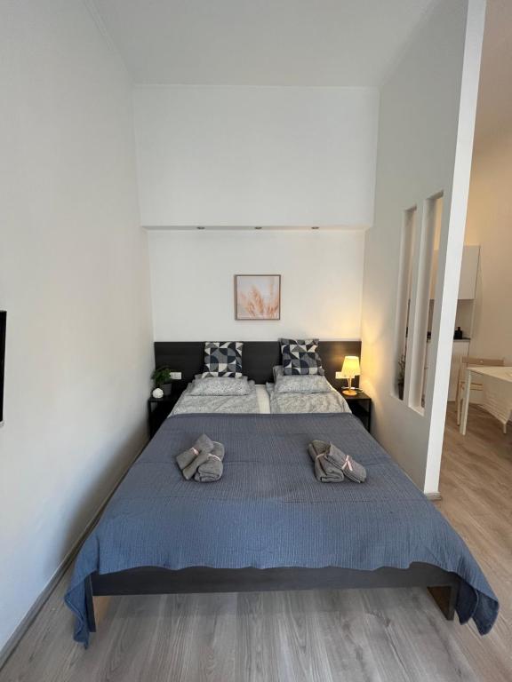 Postel nebo postele na pokoji v ubytování D58 Delux Apartments in the city center