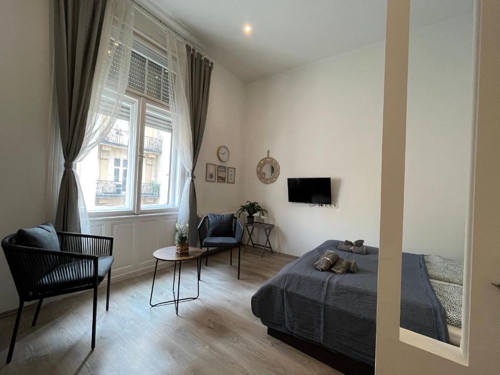 Postel nebo postele na pokoji v ubytování D58 Delux Apartments in the city center