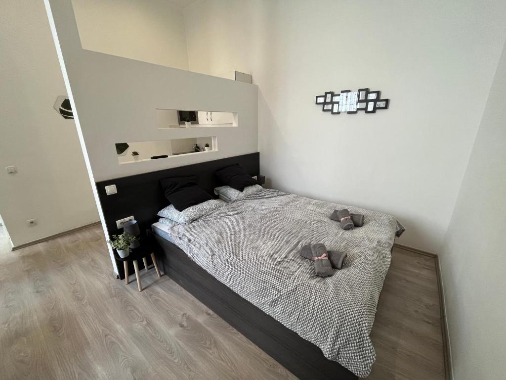 Postel nebo postele na pokoji v ubytování D58 Delux Apartments in the city center