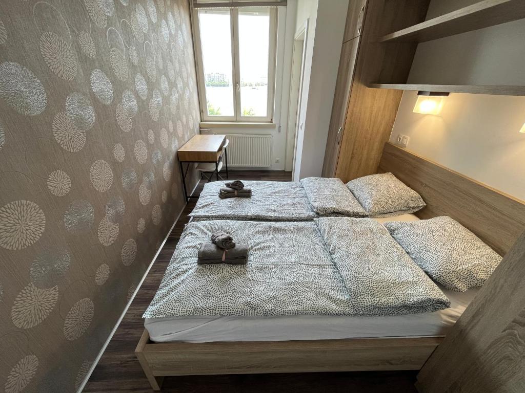 Ένα ή περισσότερα κρεβάτια σε δωμάτιο στο B38 Apartment