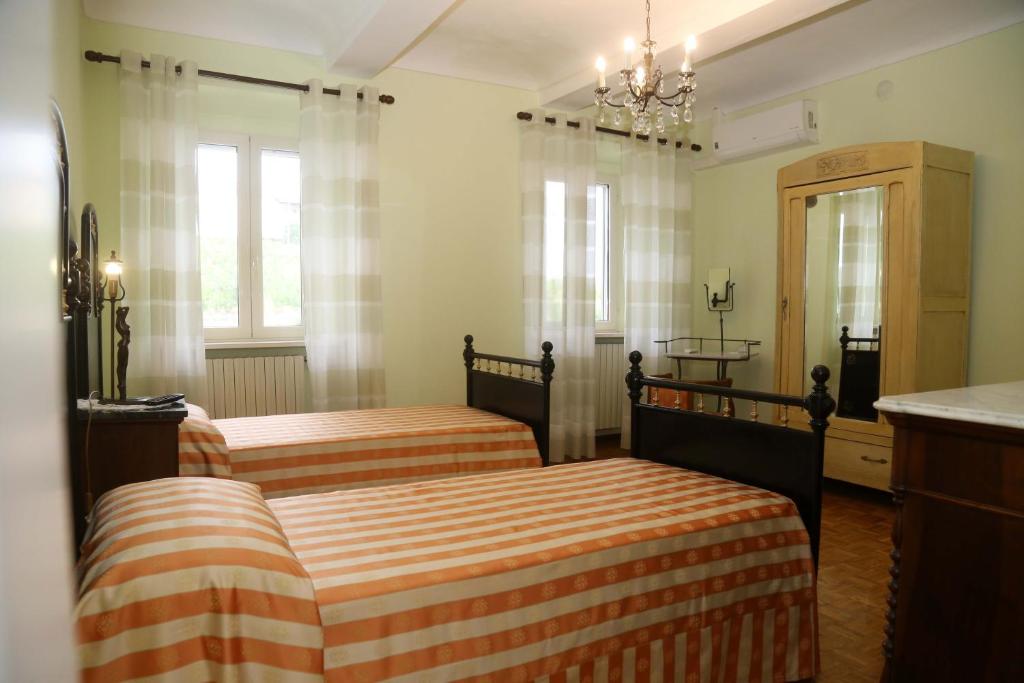 Postel nebo postele na pokoji v ubytování CA' DIJ SARACH