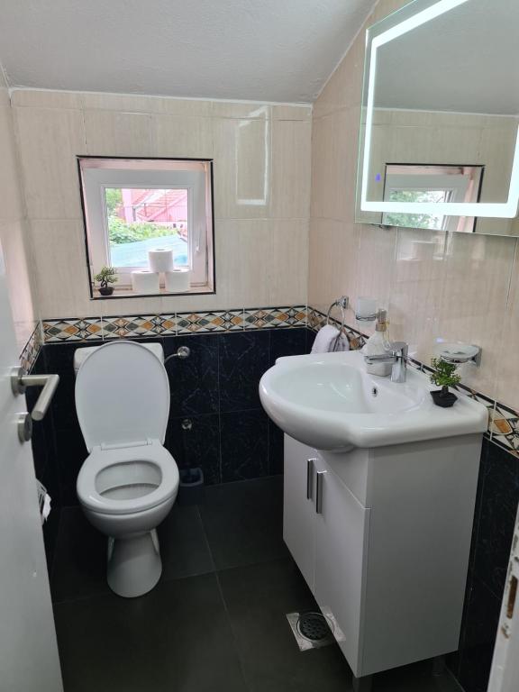 Un baño de JS apartmani