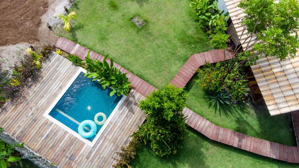 Bazén v ubytování Flow Beach House - Taipu de Fora - Península de Maraú nebo v jeho okolí