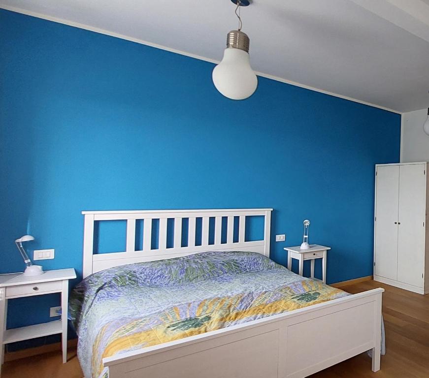 Ένα ή περισσότερα κρεβάτια σε δωμάτιο στο Ti Racconto di un Sogno Rooms - Cielo & Terra