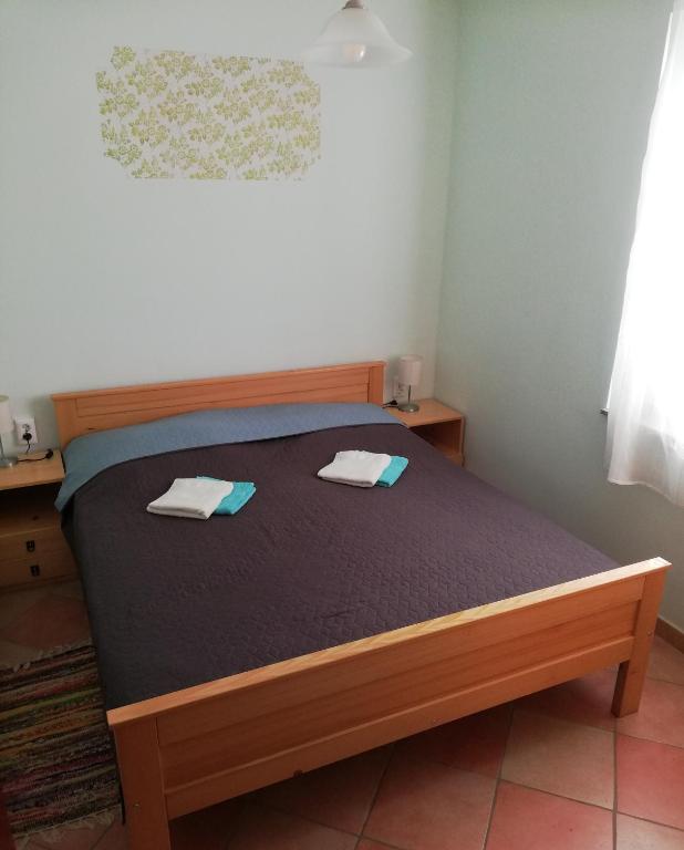 Postel nebo postele na pokoji v ubytování Apartment Antonia