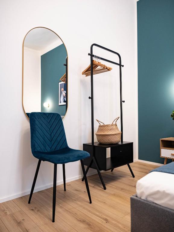 Postel nebo postele na pokoji v ubytování Moor Assarotti Suites - Genova City Center