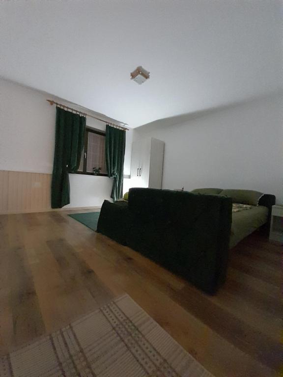 Postel nebo postele na pokoji v ubytování Bajka