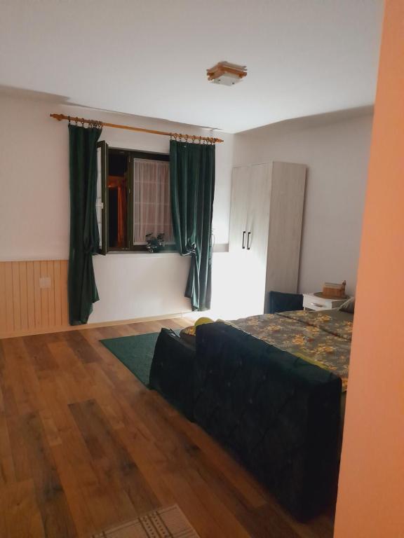 Postel nebo postele na pokoji v ubytování Bajka