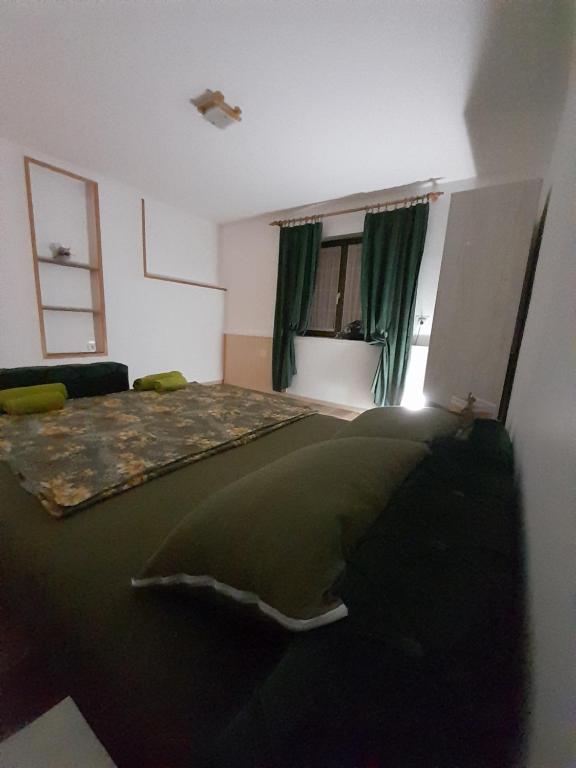 Postel nebo postele na pokoji v ubytování Bajka