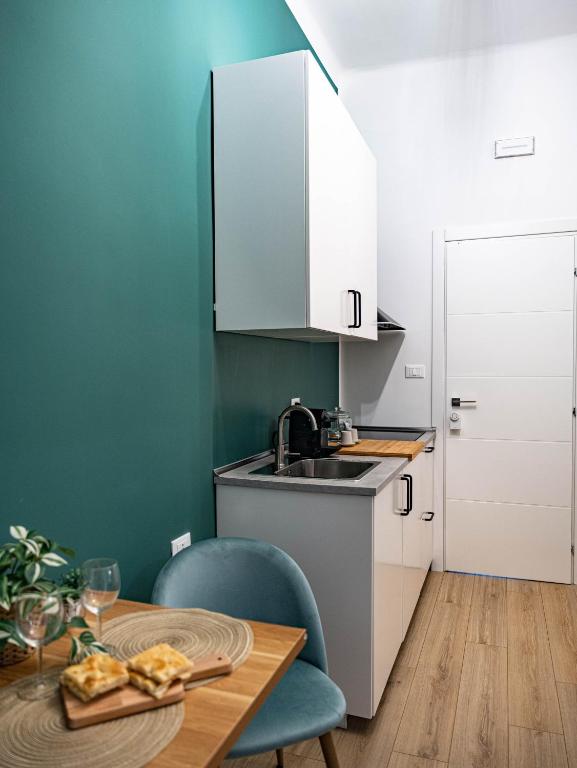 Kuchyň nebo kuchyňský kout v ubytování Moor Assarotti Suites - Genova City Center