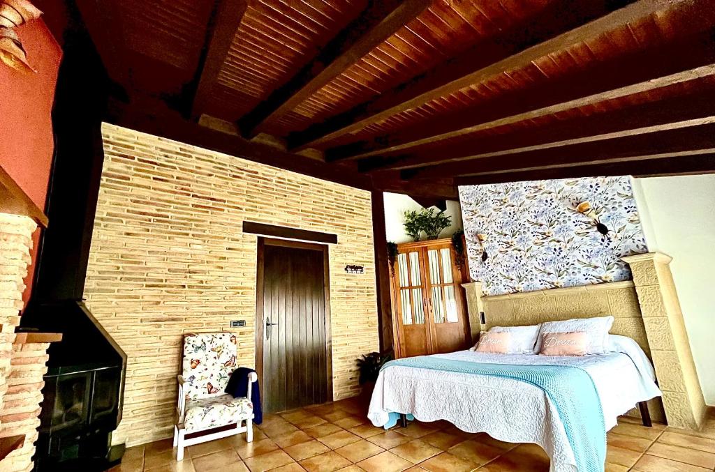 Postel nebo postele na pokoji v ubytování Agroturismo el Encuentro