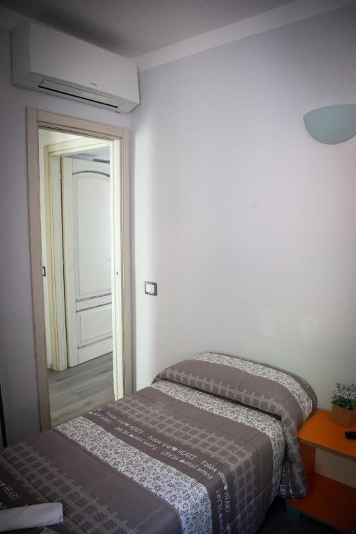 Postel nebo postele na pokoji v ubytování B&B La Torre