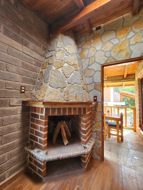 Posezení v ubytování cabaña el rio 2