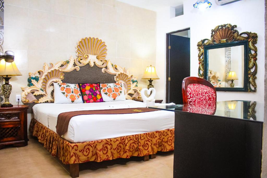 Postel nebo postele na pokoji v ubytování Palacio Canton Hotel - Valladolid