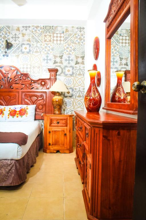 Postel nebo postele na pokoji v ubytování Palacio Canton Hotel - Valladolid