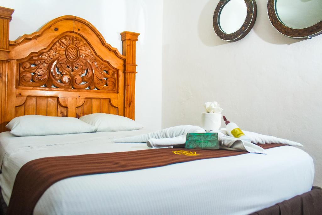 Postel nebo postele na pokoji v ubytování Palacio Canton Hotel - Valladolid