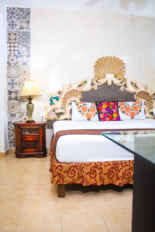 Postel nebo postele na pokoji v ubytování Palacio Canton Hotel - Valladolid