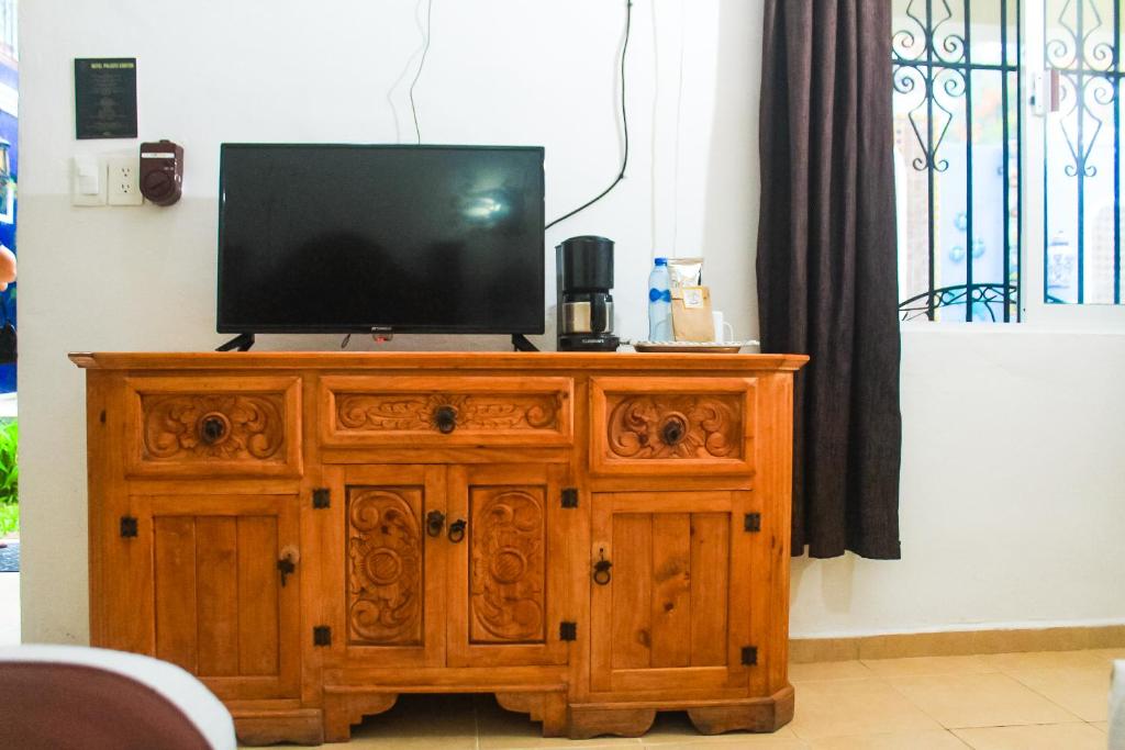 TV a/nebo společenská místnost v ubytování Palacio Canton Hotel - Valladolid