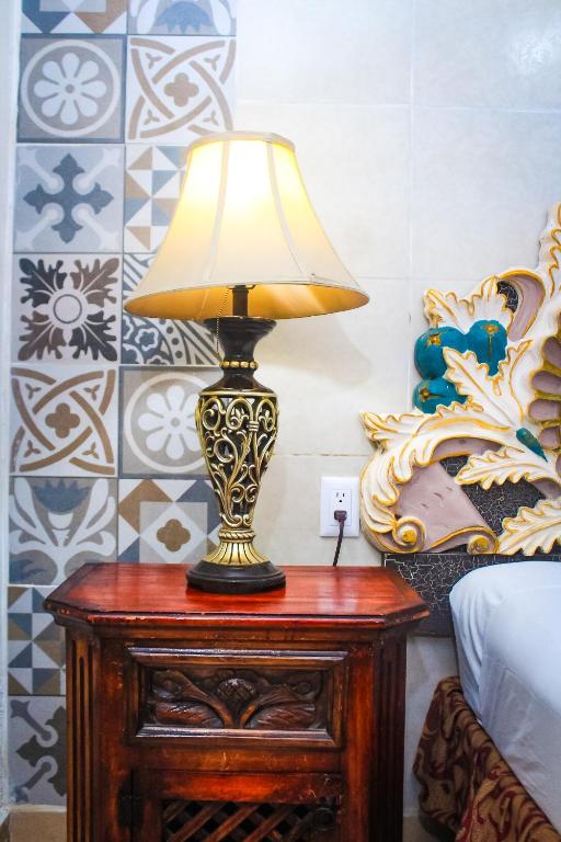 Postel nebo postele na pokoji v ubytování Palacio Canton Hotel - Valladolid