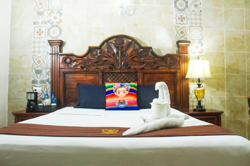 Postel nebo postele na pokoji v ubytování Palacio Canton Hotel - Valladolid