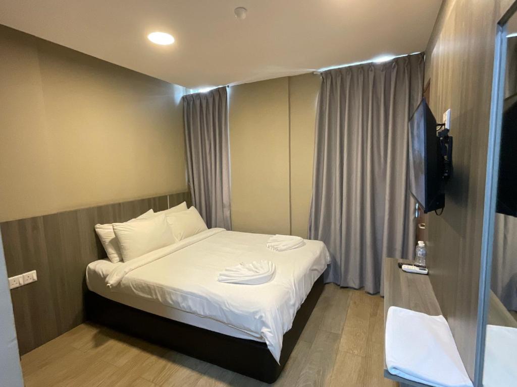 Letto o letti in una camera di Zitro Hotel
