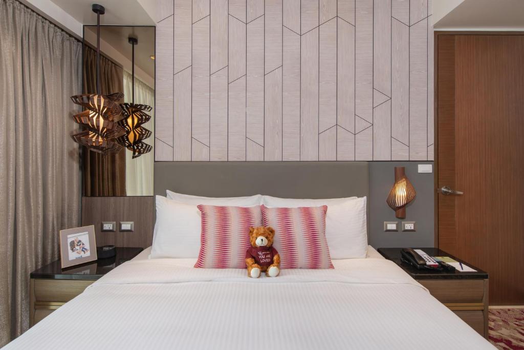Voodi või voodid majutusasutuse Somerset Central Salcedo Makati toas