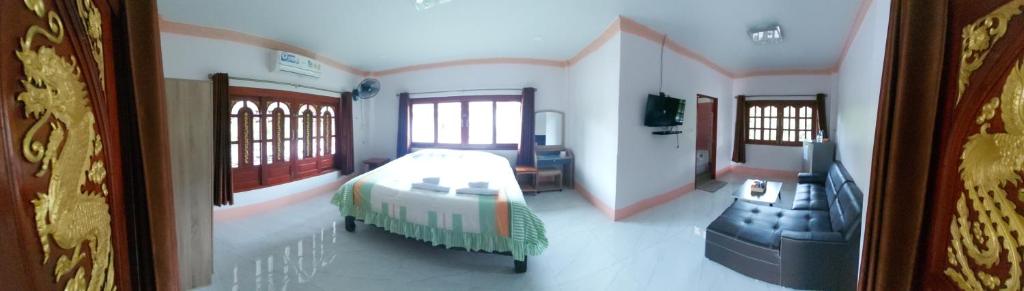 Postel nebo postele na pokoji v ubytování Khwahol Guesthouse