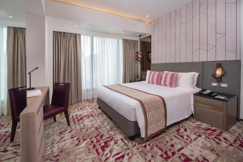 Voodi või voodid majutusasutuse Somerset Central Salcedo Makati toas