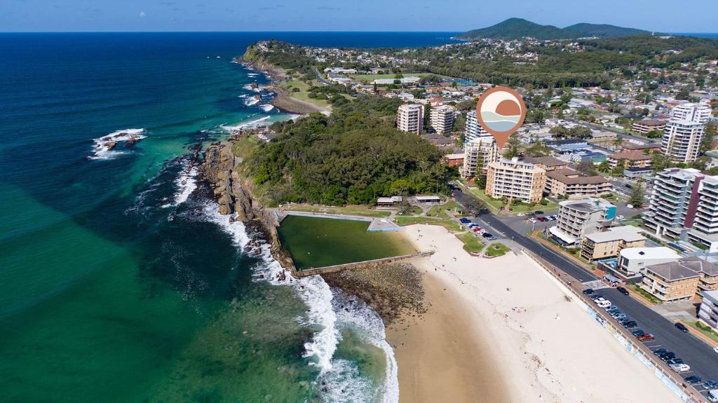an aerial view of a beach and the ocean at Tenerife unit 2 in Forster