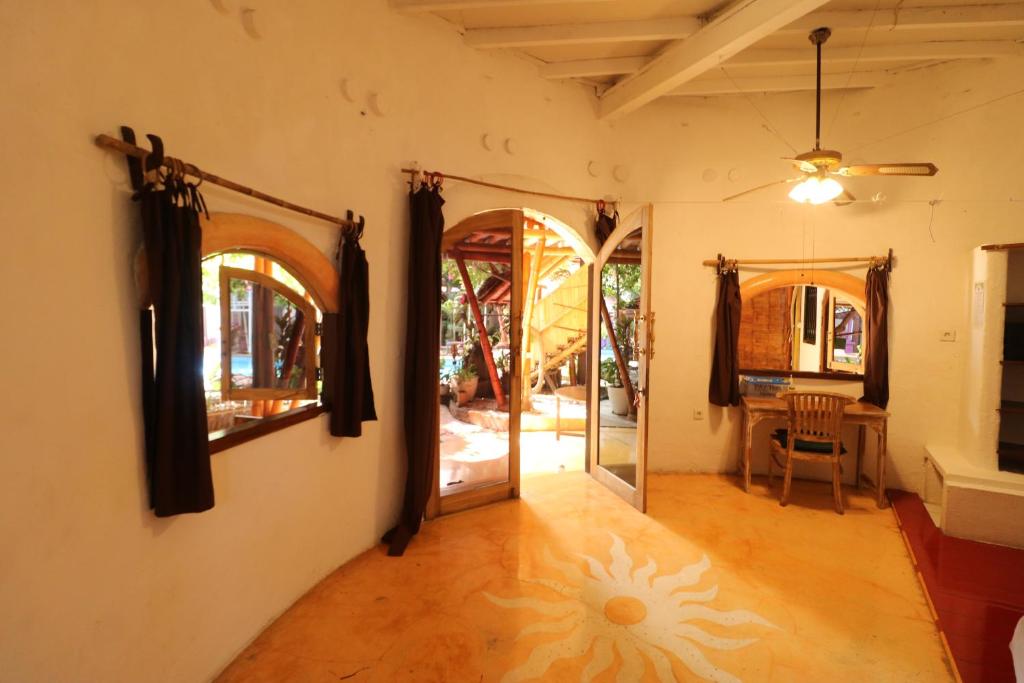 Un ou plusieurs lits dans un hébergement de l'établissement Serenity Eco Guesthouse - CHSE certified