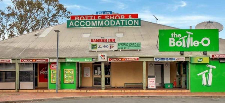 a store front of a building on a street at Kambah Inn in Kambah