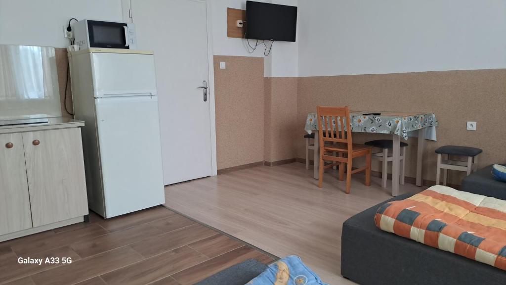 Noclegi , pokoje gościnne - Viervoudige Kamer Met Uitzicht Op De Tuin
