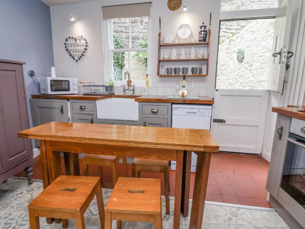 Η κουζίνα ή μικρή κουζίνα στο Millgate Cottage