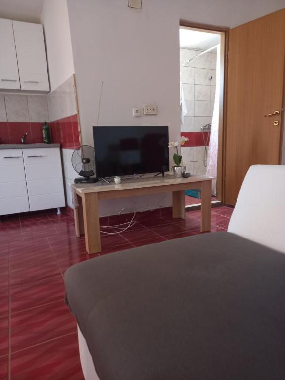 Kuchyňa alebo kuchynka v ubytovaní Apartman Malahov