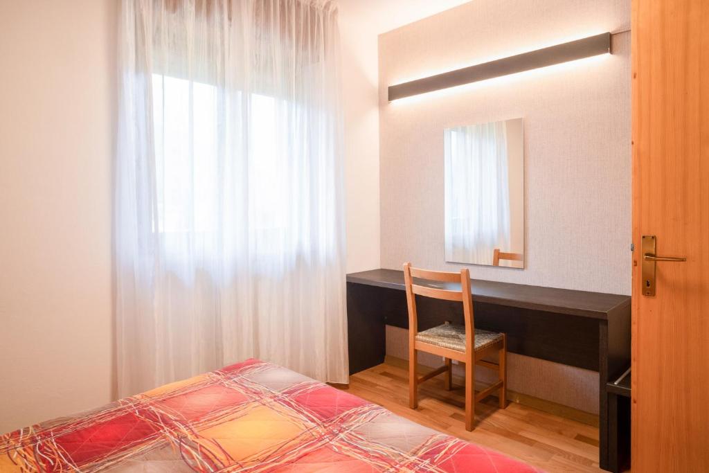 Postel nebo postele na pokoji v ubytování Residence Viola