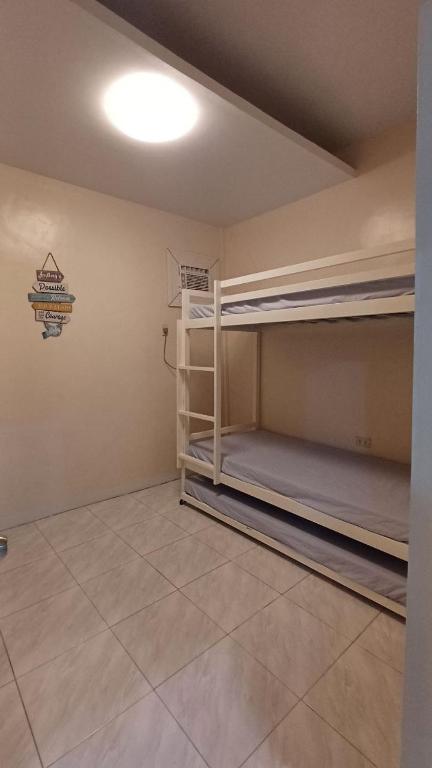 Postel nebo postele na pokoji v ubytování Jens Samal Vacation Rental - Centrally Located - Fully Furnished 2br WIFI