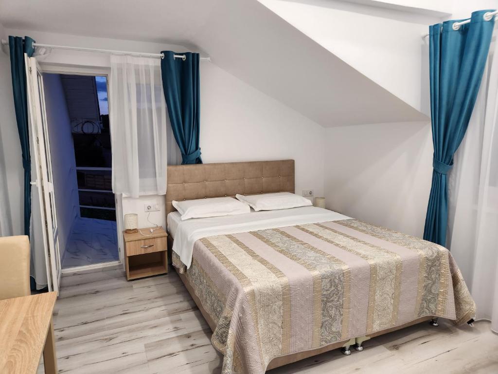 Postel nebo postele na pokoji v ubytování Vila Reghina