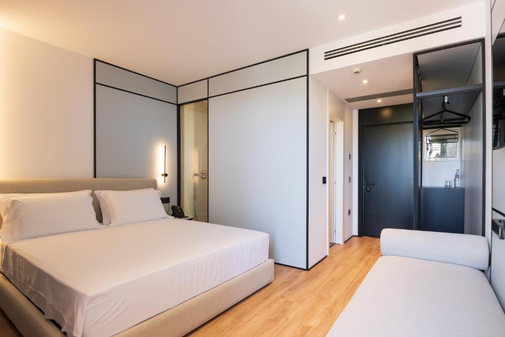 Postel nebo postele na pokoji v ubytování Mango Luxury Resorts