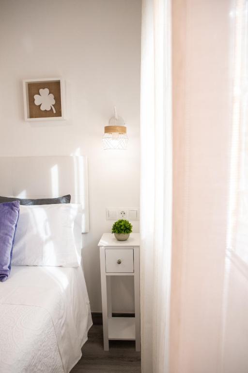 A bed or beds in a room at Apartamentos Linersol