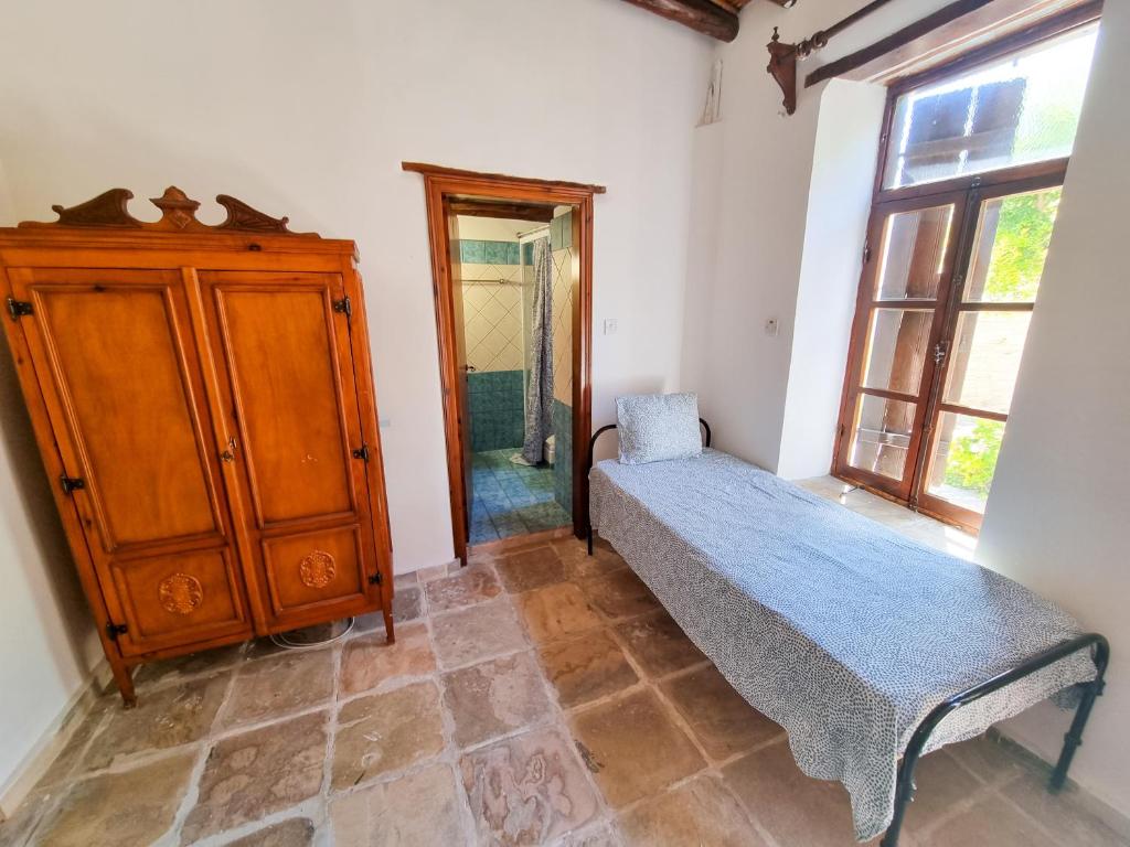 Postel nebo postele na pokoji v ubytování Athena's Pool Oasis