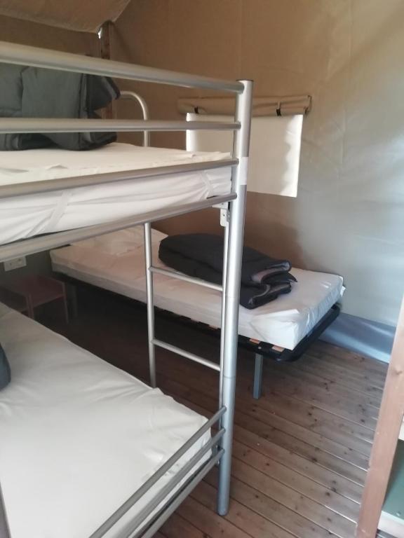 Postel nebo postele na pokoji v ubytování UCPA Eco Lodge