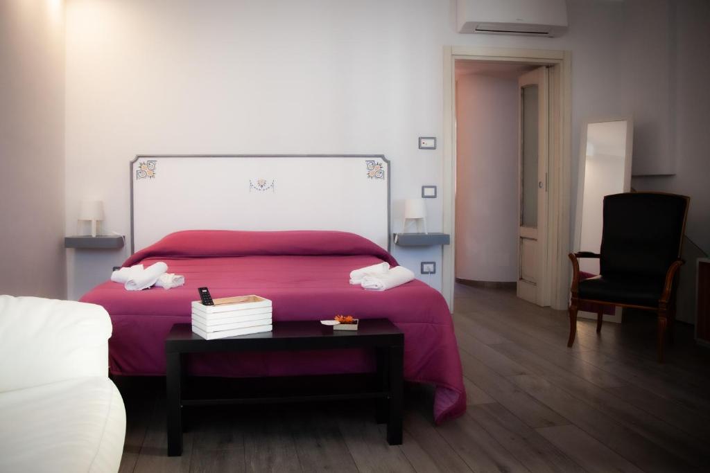 Postel nebo postele na pokoji v ubytování B&B La Torre