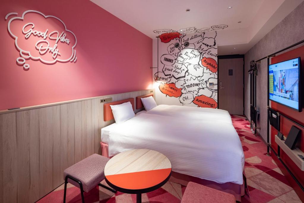 Postel nebo postele na pokoji v ubytování Hotel Kintetsu Universal City