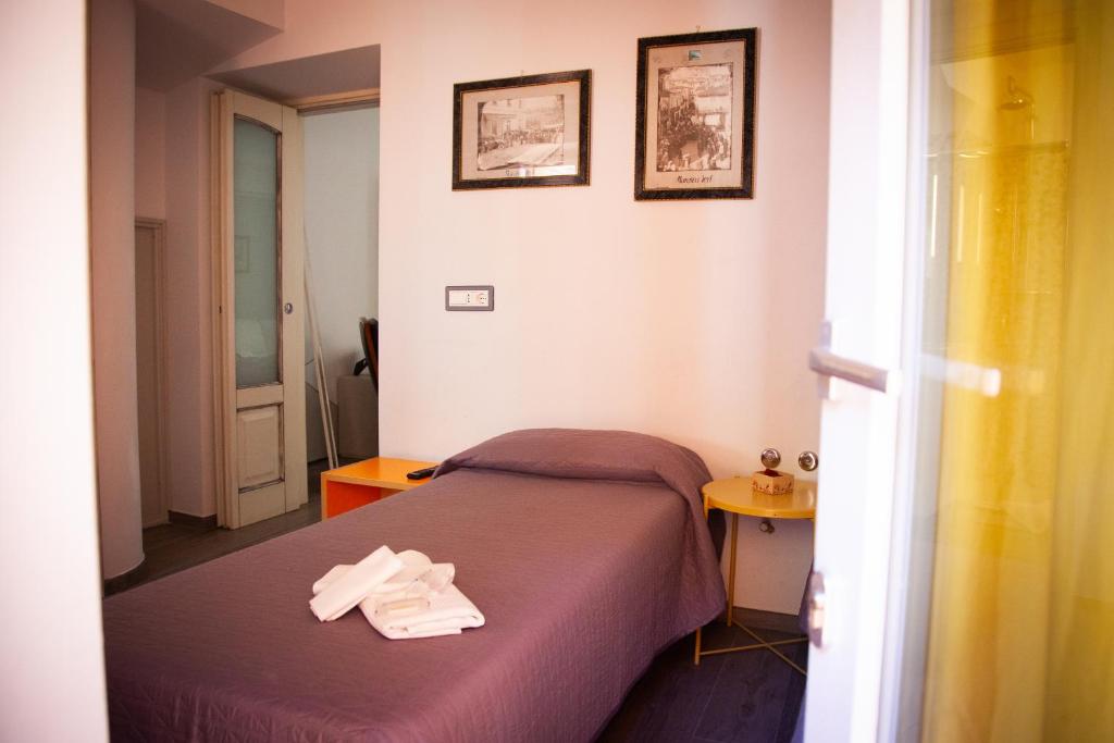 Postel nebo postele na pokoji v ubytování B&B La Torre
