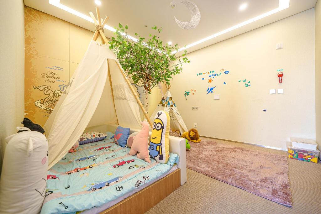 Postel nebo postele na pokoji v ubytování Gloucester Hotel Incheon