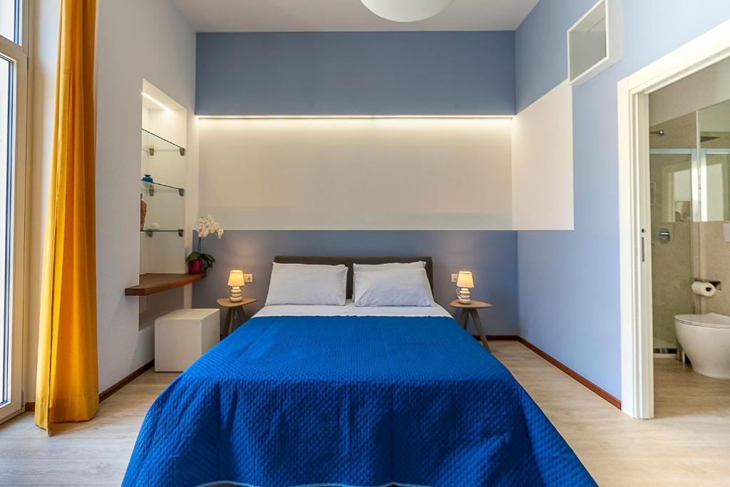 Postel nebo postele na pokoji v ubytování LecceMia B&B