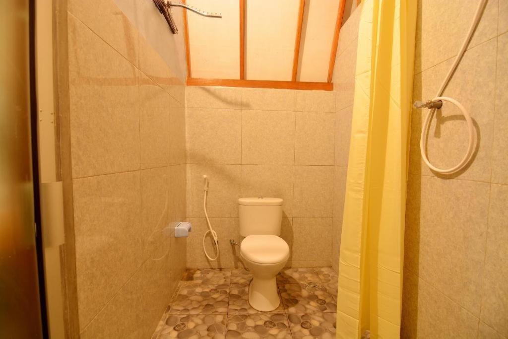 Koupelna v ubytování Bale Baleku Homestay