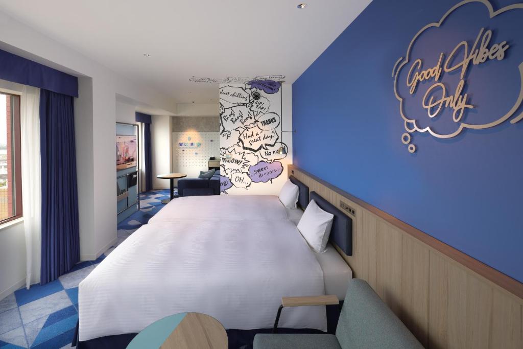 Postel nebo postele na pokoji v ubytování Hotel Kintetsu Universal City